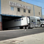 Company truck being unloaded in CA