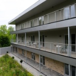 every bedroom has it's own balcony and view of the gardens at Hickling Lodge, Rusticus