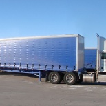 Mid-Am Building Supply Curtain Side Tractor Trailer