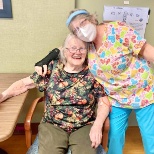 Dorothy and Tammy enjoy a laugh and a hug