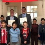 Jeb Balise and Mayor of West Springfield read to children as a part of Link to Libraries program