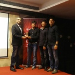 Receiving award from CEO of Company.