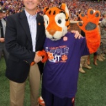 New president, Jim Clements, and the tiger mascot at the Military Appreciation game vs Citadel.